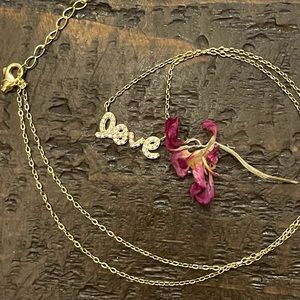 gold LOVE nameplate necklace Iced in simulated diamonds in sterling silver.